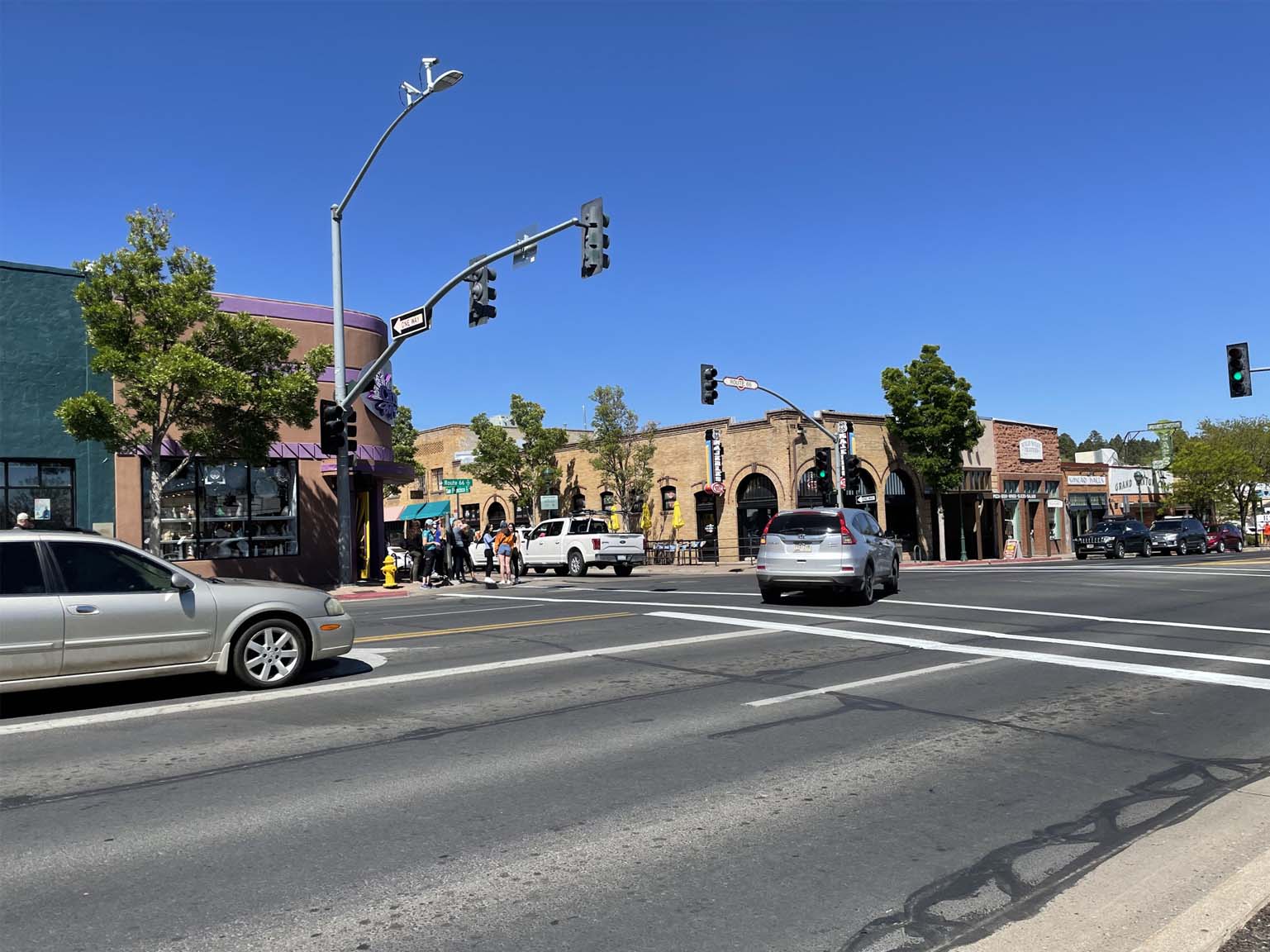 Cars at intersection driving on Lone Tree Rd