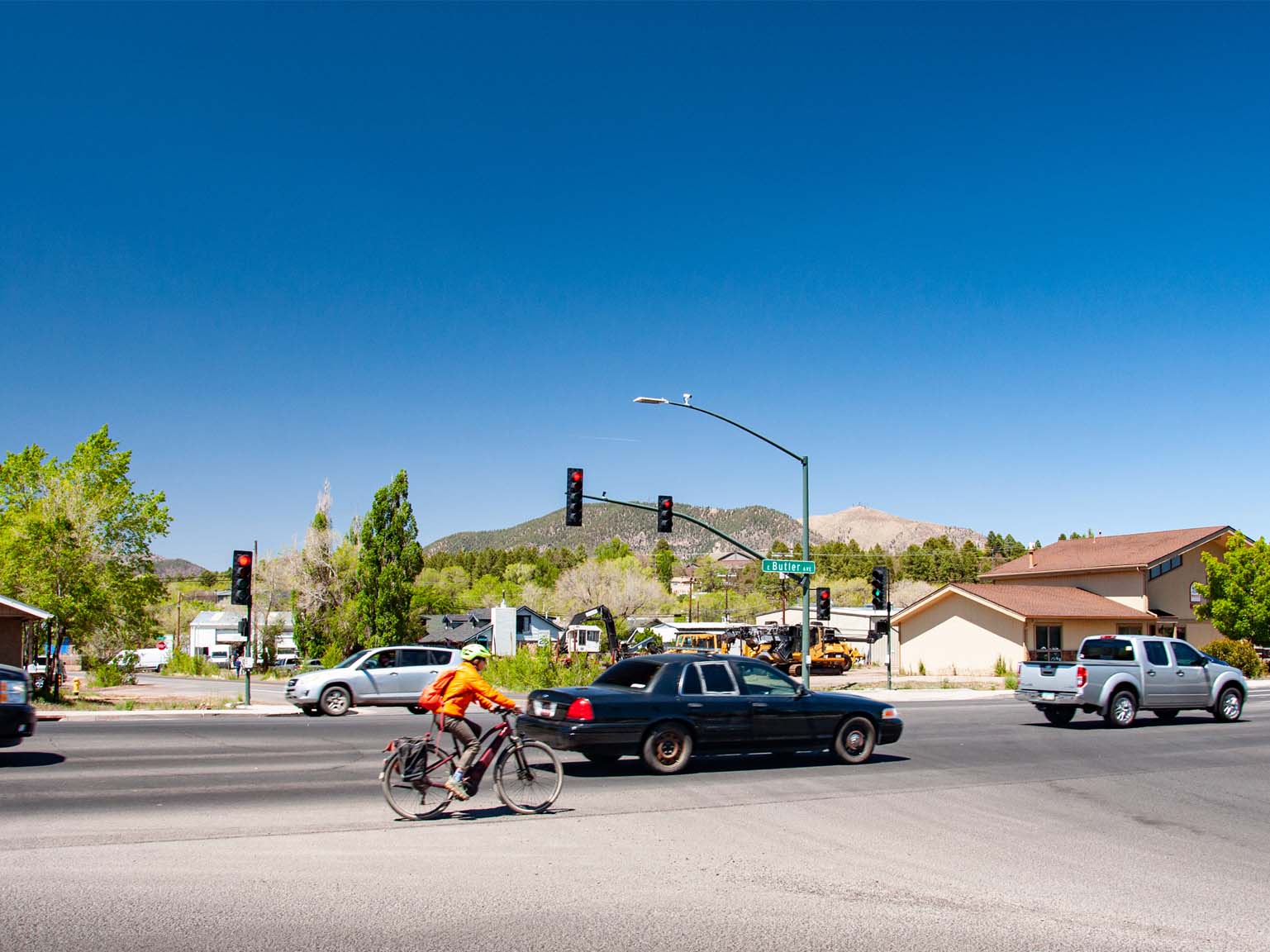 Cars driving at the intersection of Lone Tree Rd and Butler Avenue